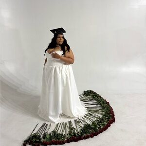 Elegant White Gown with Graduation Cap